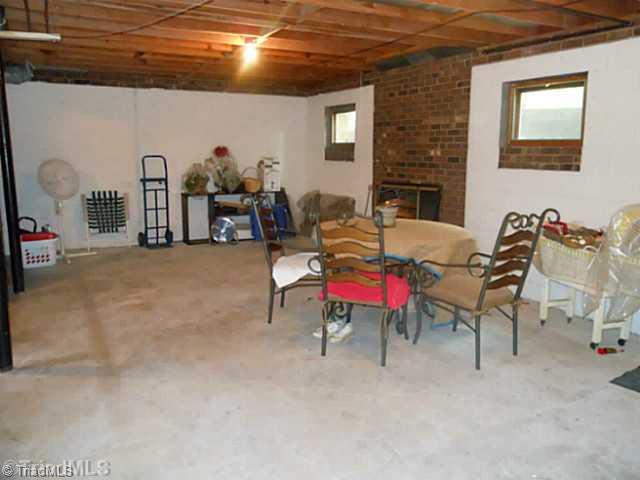 1170 Sweetbriar Road High Point, NC 27262 - Photo 15 of 16 Other. The basement has a fireplace and is just begging to be fiinished into a fabulous game room . Plenty of space for a den, pool table and ping pong. There s additional storage in the basement and also in the 2 car garage.
