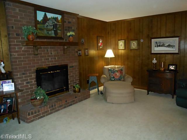 1170 Sweetbriar Road High Point, NC 27262 - Photo 5 of 16 Den/Family/Great Room. Cozy up by the gas fireplace in the den.