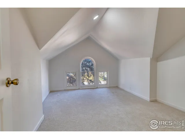 a view of empty room with windows