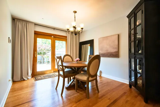a dining room with furniture window wooden floor