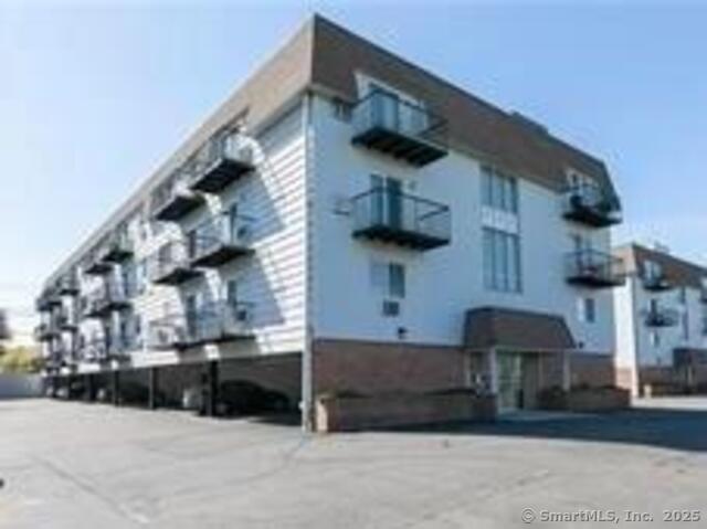 155 Short Beach Road, Unit 206 Stratford, CT 06615 - Photo 27 of 31 a view of outdoor space with plants