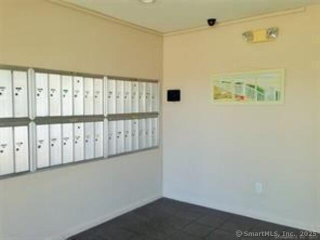 155 Short Beach Road, Unit 206 Stratford, CT 06615 - Photo 3 of 31 a view of a hallway with entryway