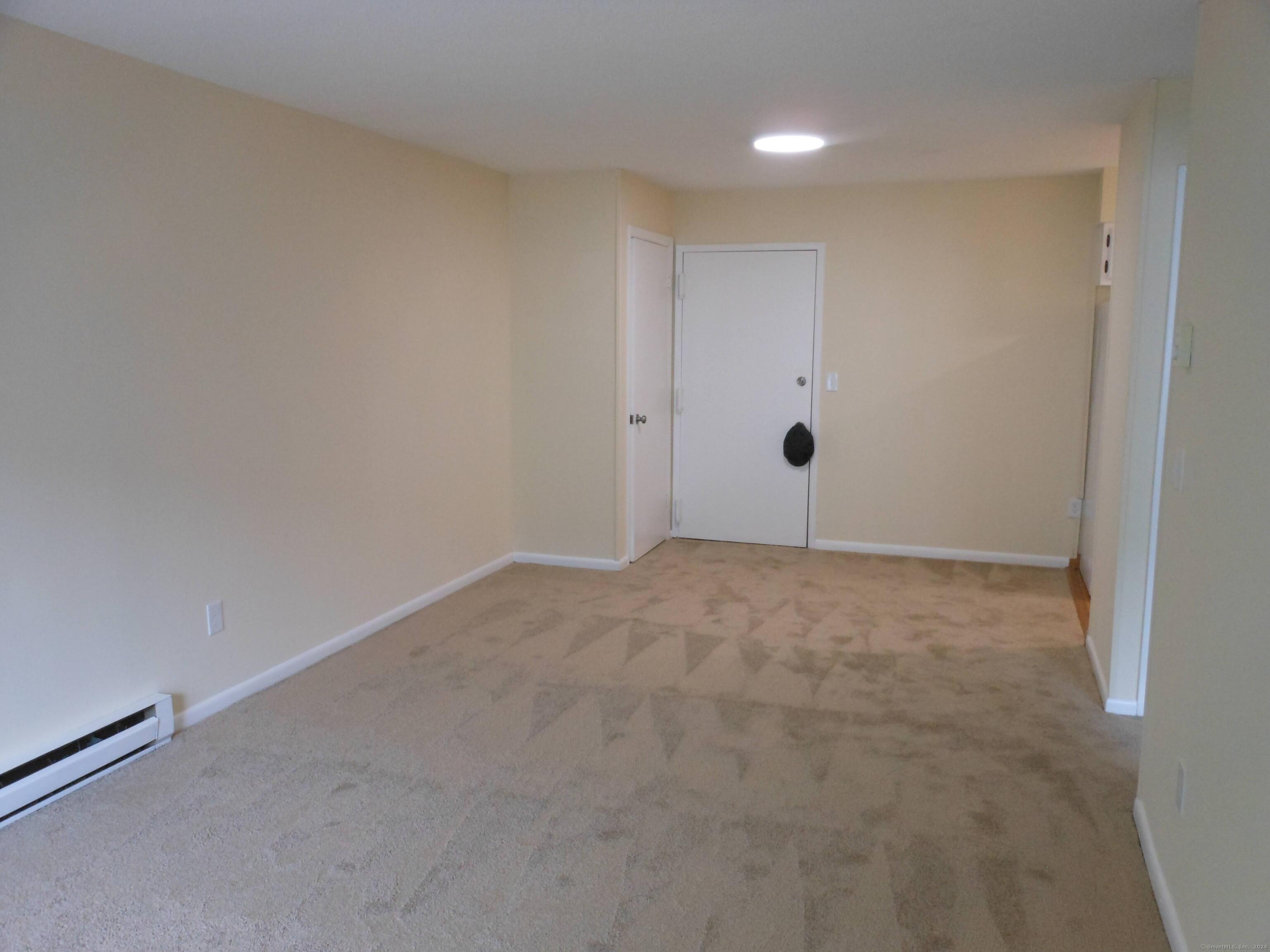 155 Short Beach Road, Unit 206 Stratford, CT 06615 - Photo 9 of 31 a view of an empty room