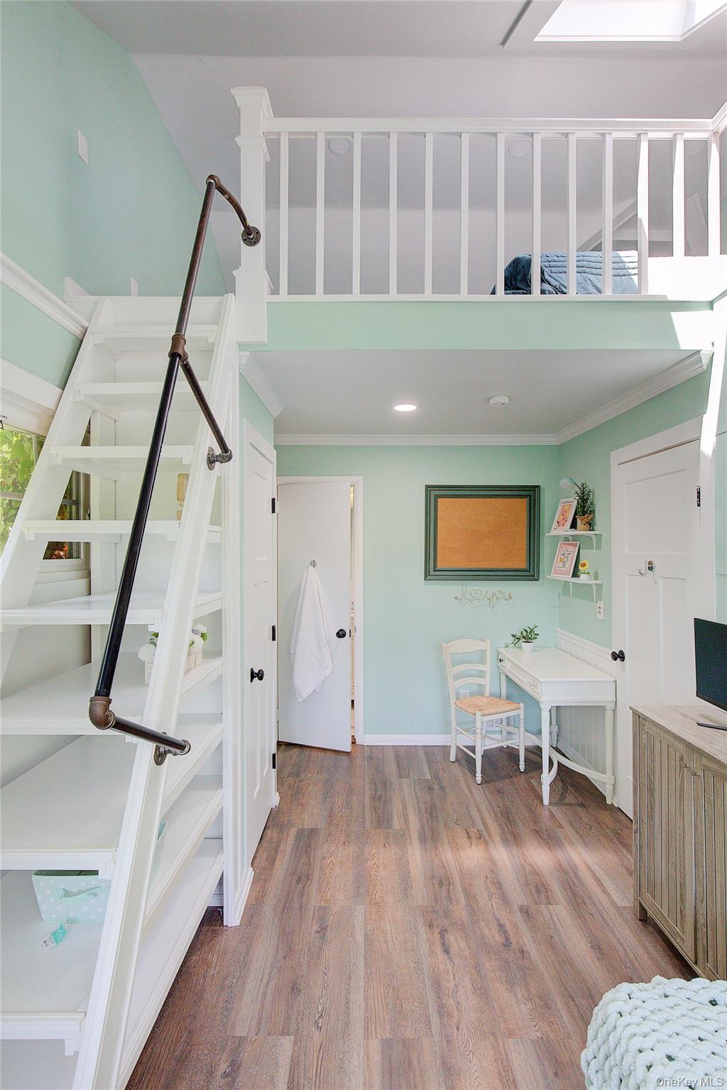 2 Spring Hollow Road Centerport, NY 11721 - Photo 13 of 44 Stairway with wood finished floors and ornamental molding