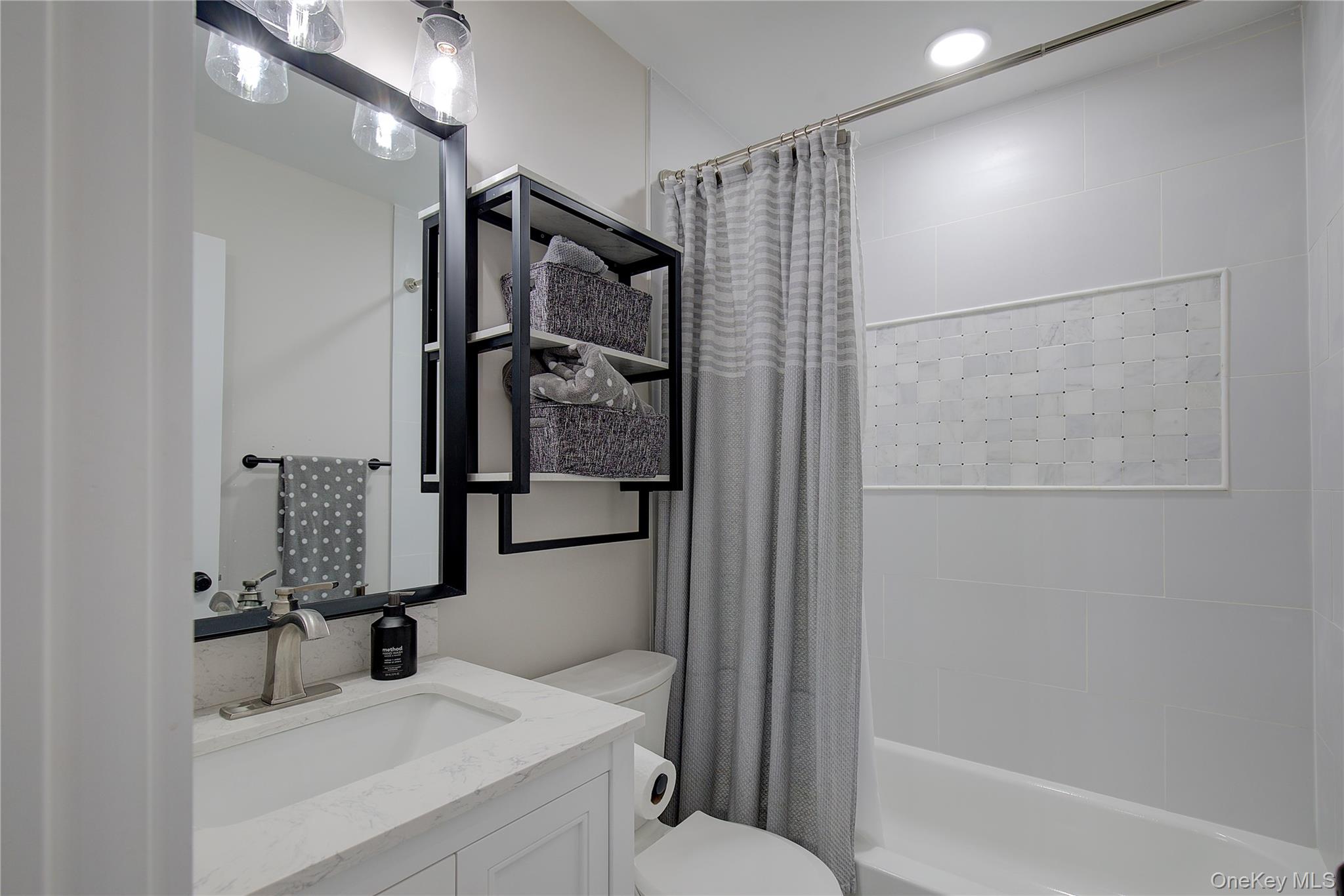 2 Spring Hollow Road Centerport, NY 11721 - Photo 15 of 44 Full bath with vanity, shower / bath combination with curtain, and recessed lighting