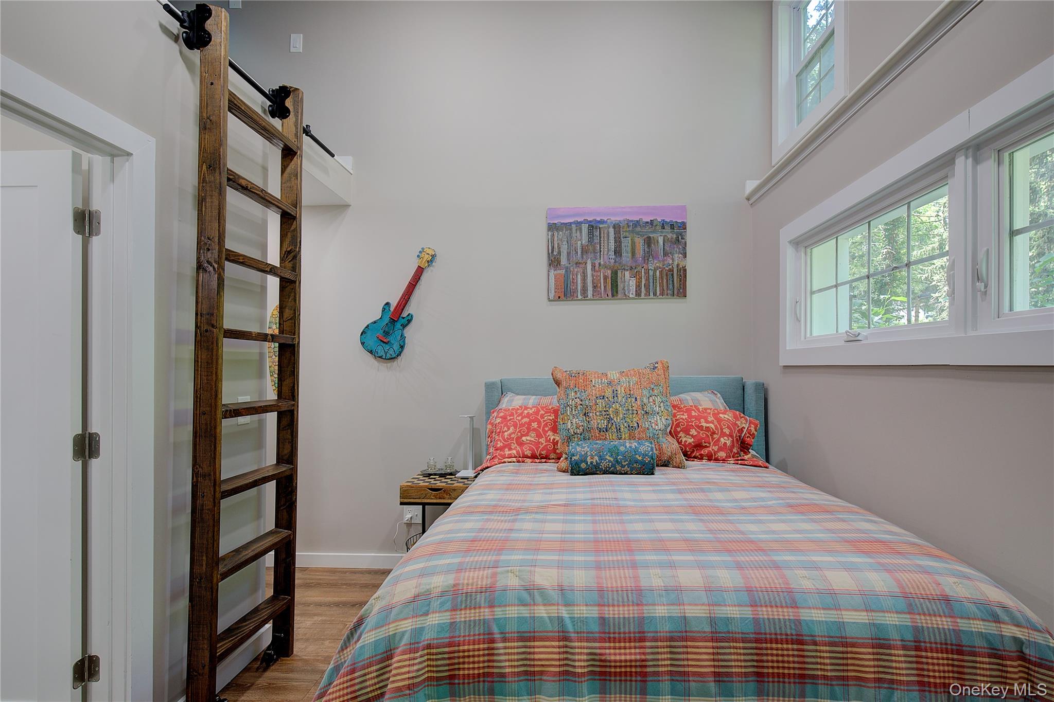 2 Spring Hollow Road Centerport, NY 11721 - Photo 16 of 44 Bedroom featuring light wood-style floors and baseboards