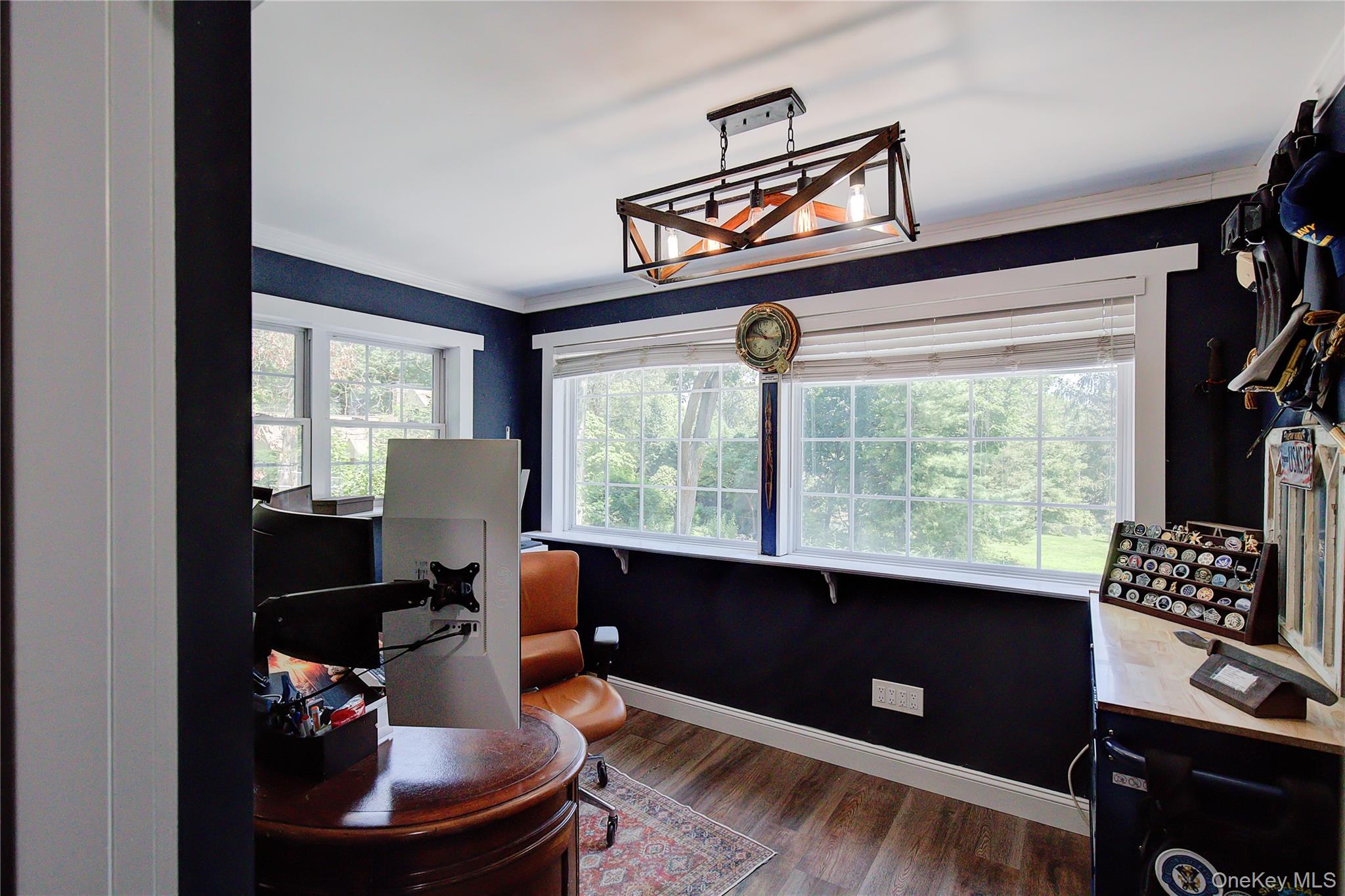 2 Spring Hollow Road Centerport, NY 11721 - Photo 21 of 44 Office with ornamental molding, dark wood finished floors, and healthy amount of natural light