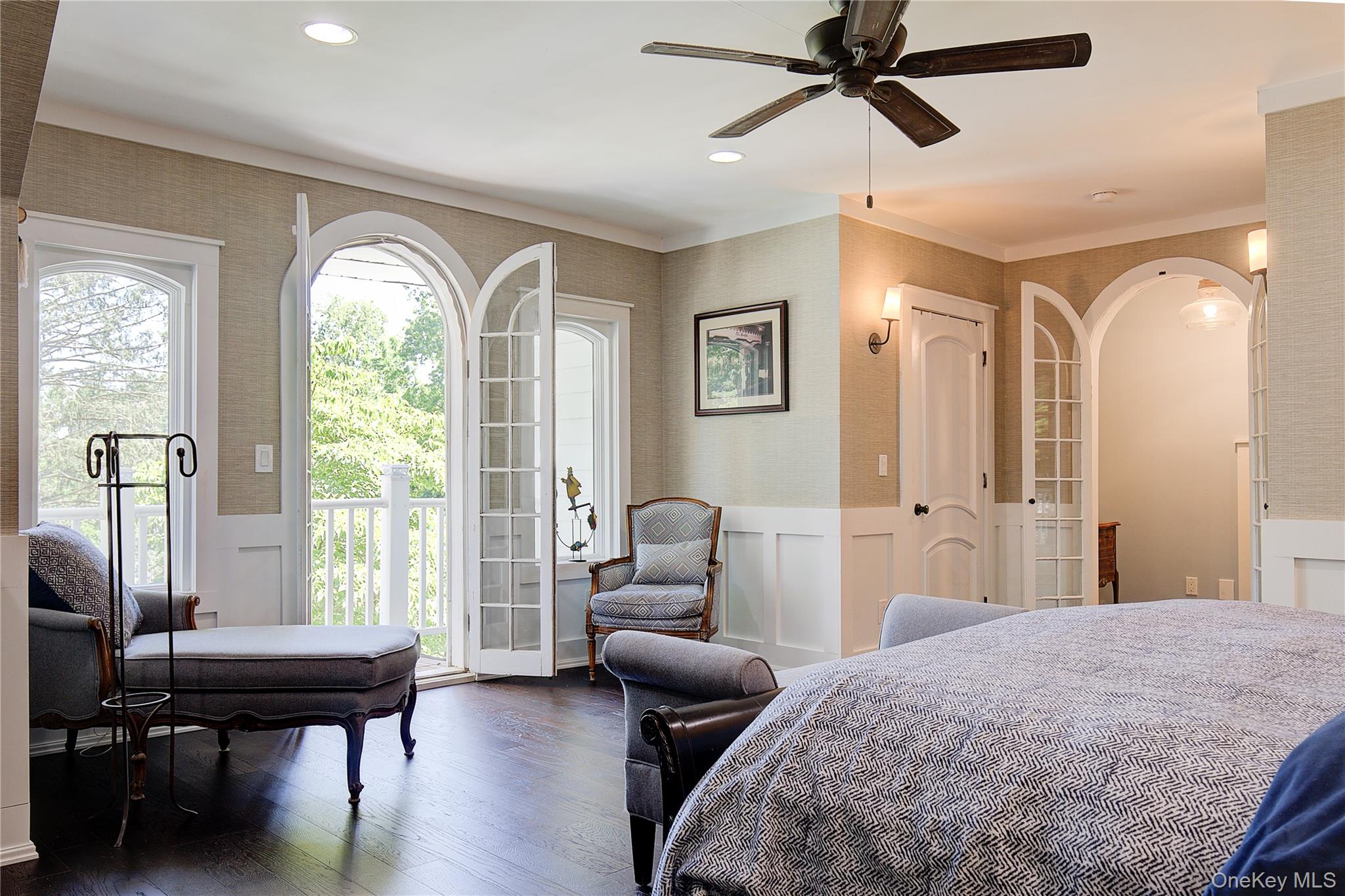 2 Spring Hollow Road Centerport, NY 11721 - Photo 25 of 44 Bedroom featuring a wainscoted wall, wallpapered walls, hardwood / wood-style floors, a decorative wall, and recessed lighting