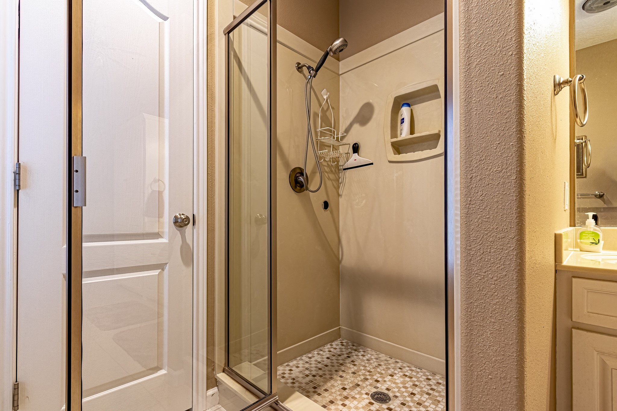 27 Marina Court Coldspring, TX 77331 - Photo 31 of 38 Walk-in shower in the primary bath.