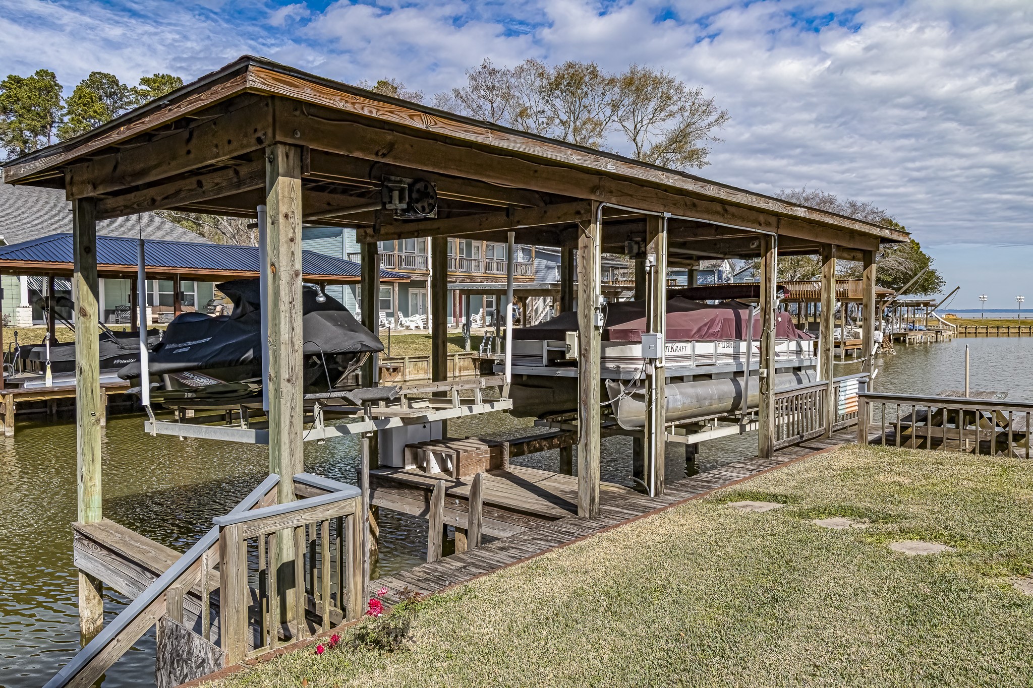 27 Marina Court Coldspring, TX 77331 - Photo 6 of 38 Private covered boathouse with serene open-water views.