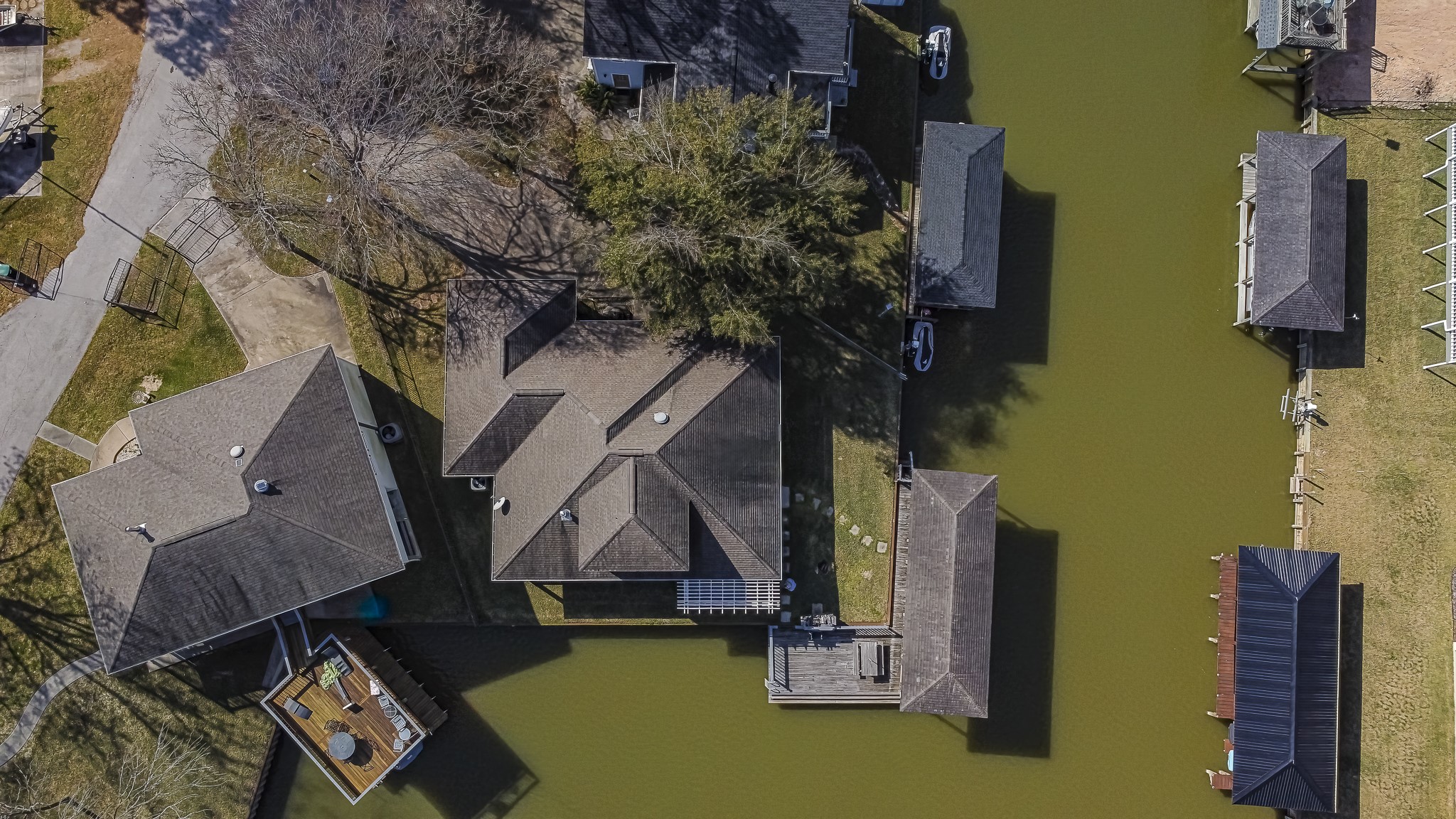 27 Marina Court Coldspring, TX 77331 - Photo 7 of 38 Aerial view showcasing prime waterfront positioning with private boathouse.