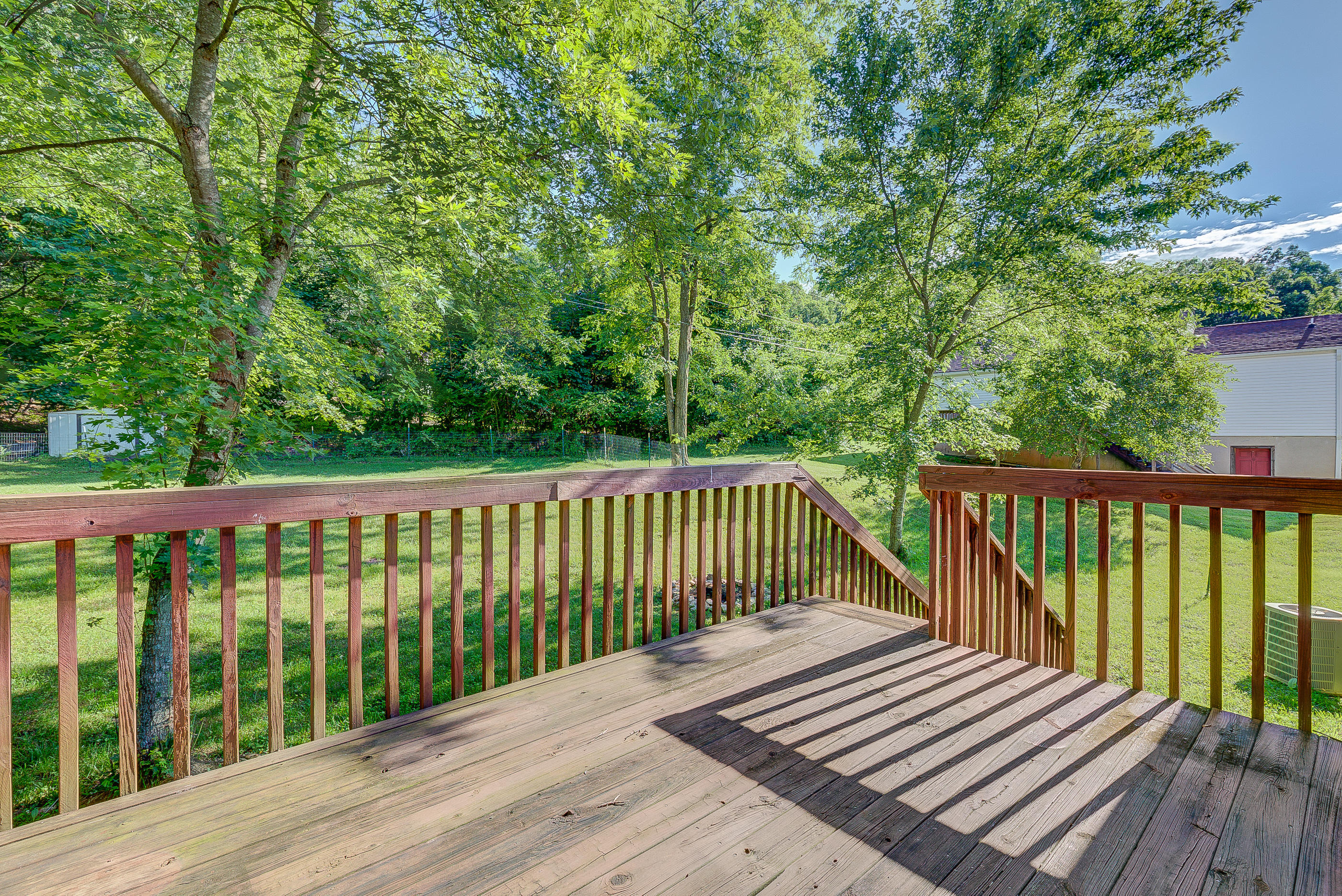 4431 Keefer Road Roanoke, VA 24018 - Photo 22 of 23 a balcony with wooden floor and fence