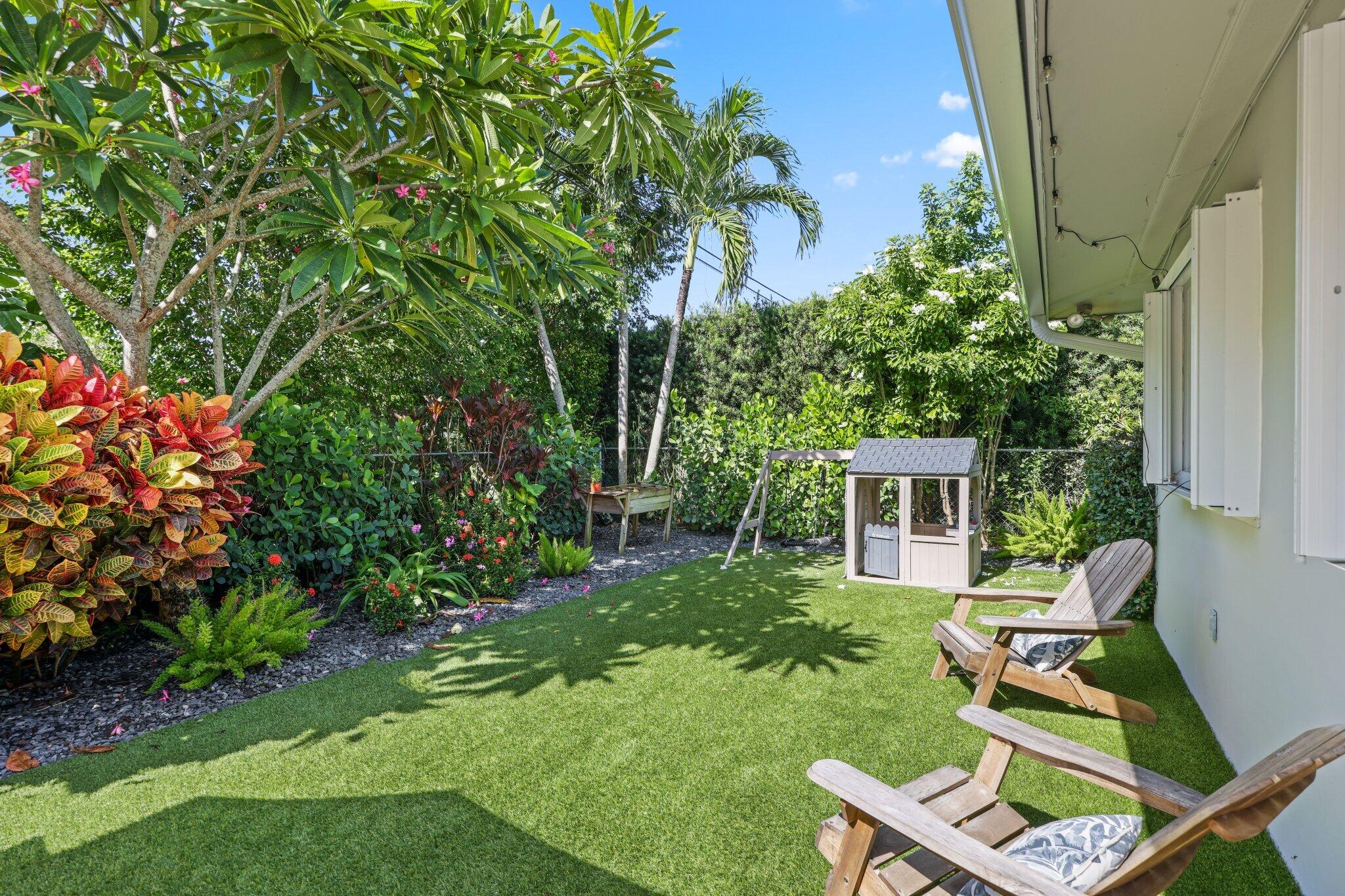 926 Southwest 1st Street Boca Raton, FL 33486 - Photo 47 of 60 a view of backyard of house with seating space