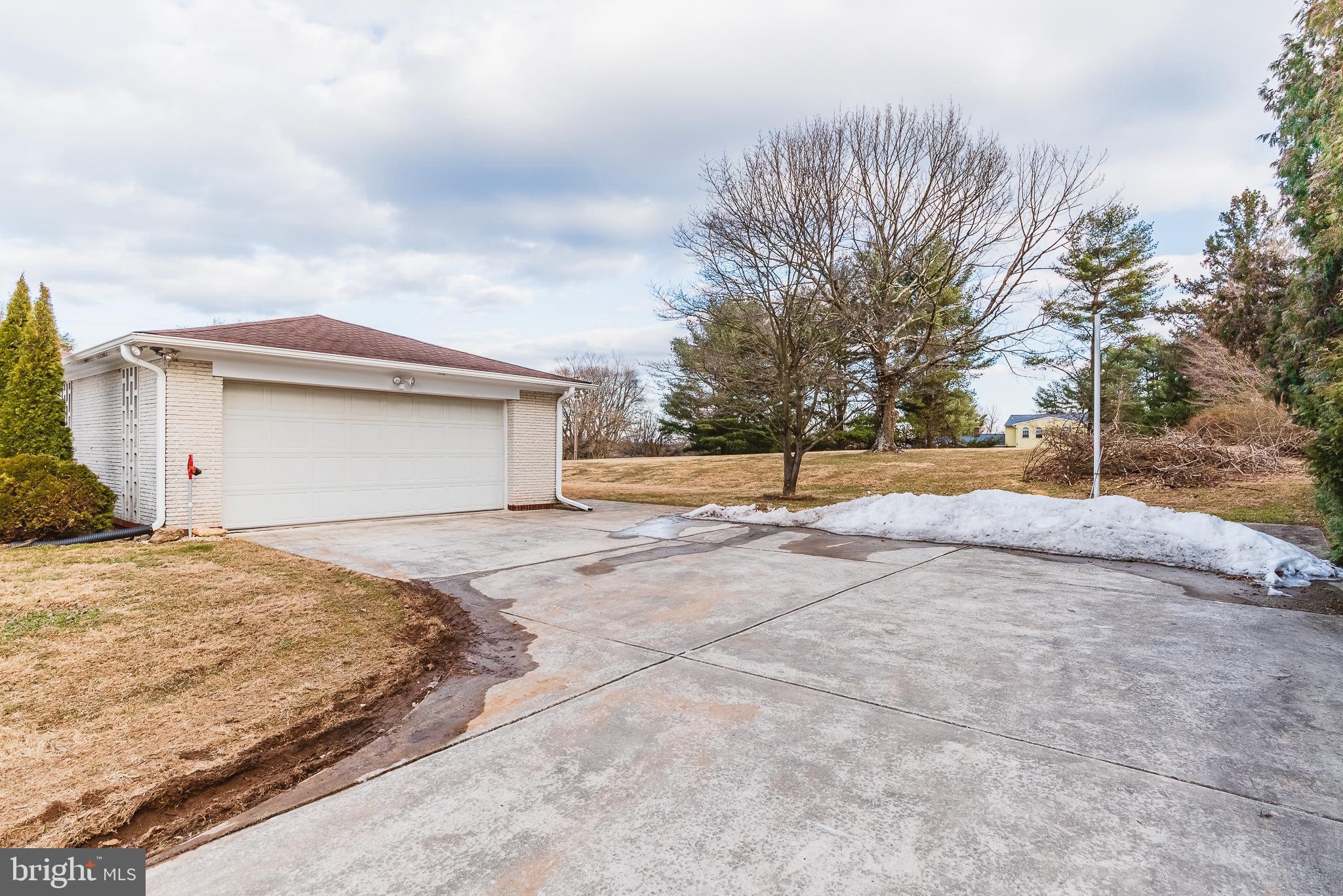4819 Carroll Manor Road Baldwin, MD 21013 - Photo 2 of 35 Concrete Drive Way leading to 2 Car Garage