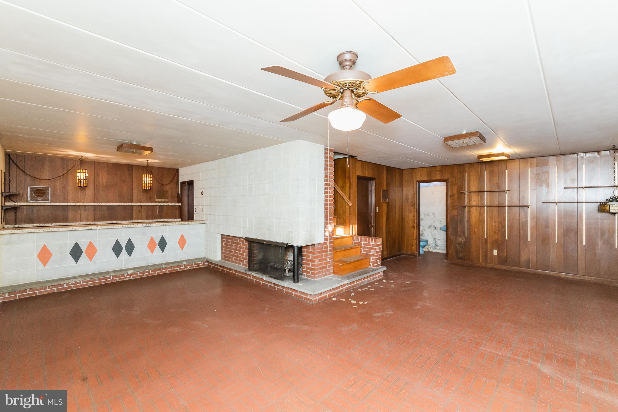 4819 Carroll Manor Road Baldwin, MD 21013 - Photo 28 of 35 Lower Level Wet Bar and Wood Burning FP