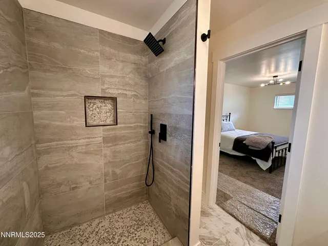 a en suite bathroom with a shower