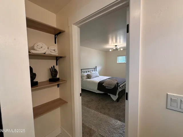 a en suite bathroom with a sink and a mirror