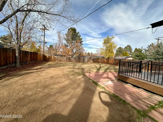 a view of a pathway with a yard