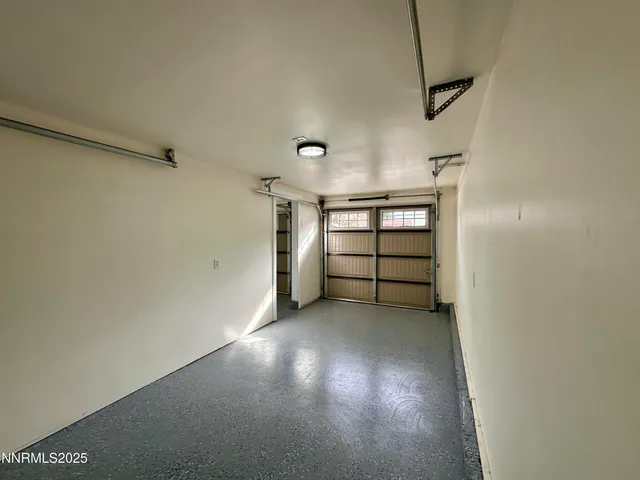 a view of a room with a garage