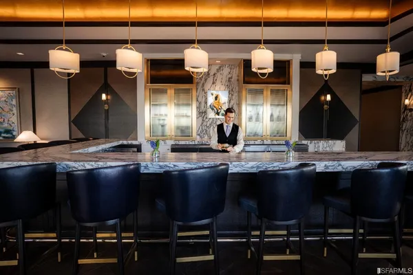 a kitchen with a table and chairs in it