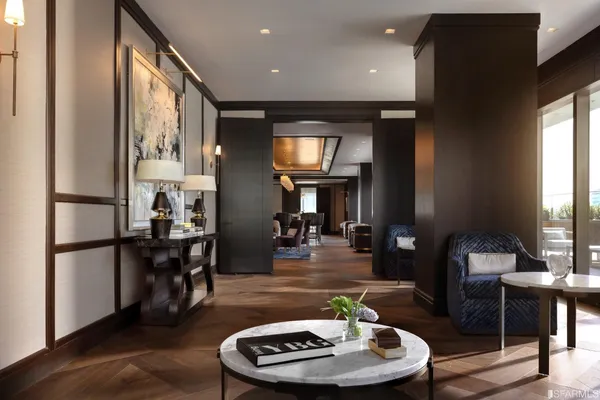 a room with furniture and a wooden floor