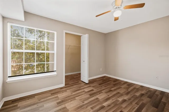 a view of a balcony with a floor to ceiling window