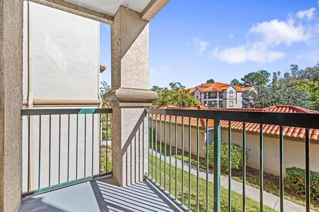 a view of a bathroom with a glass door