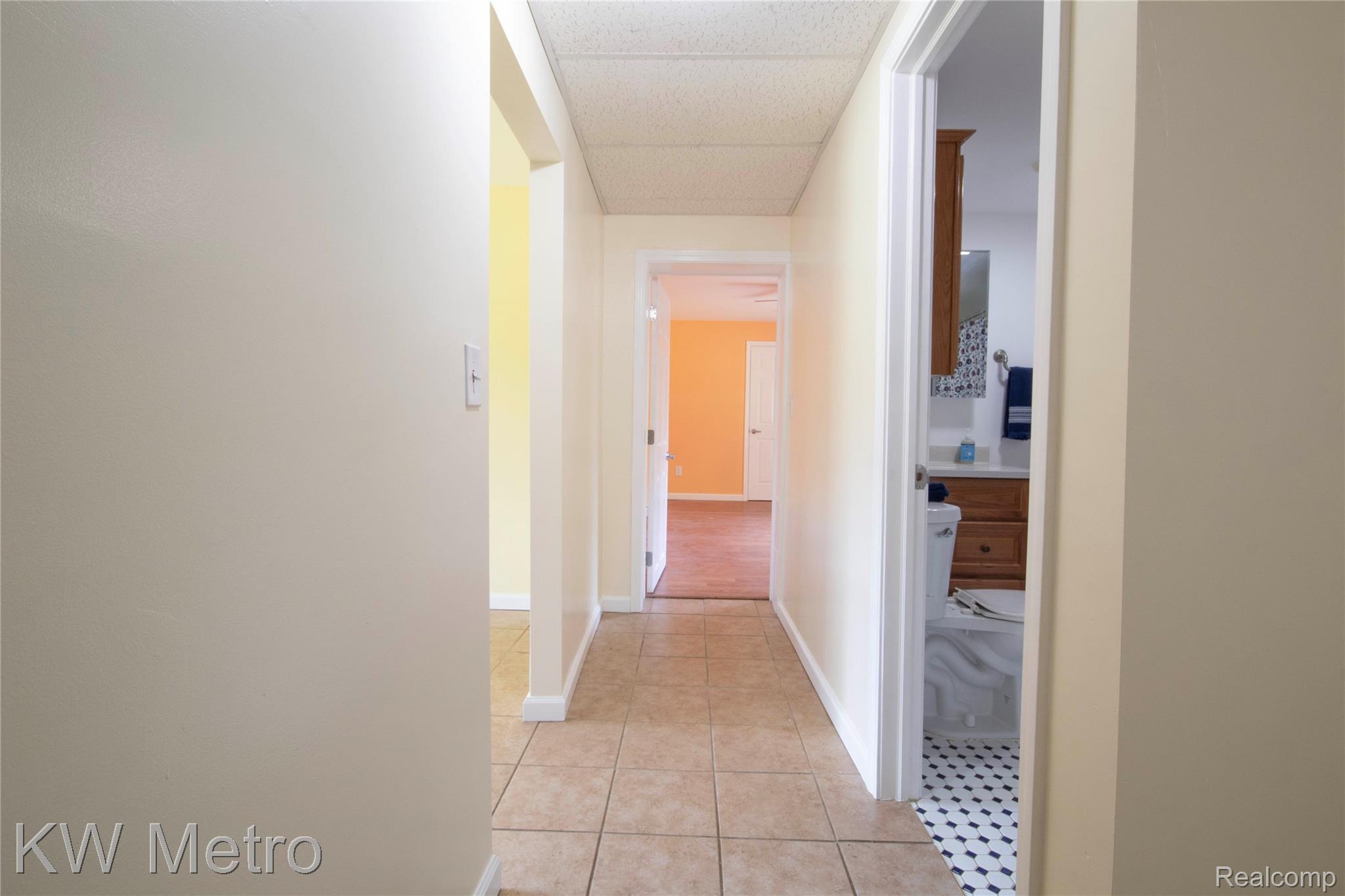 10800 Holland Road Taylor, MI 48180 - Photo 11 of 16 Hallway view from the laundry room.