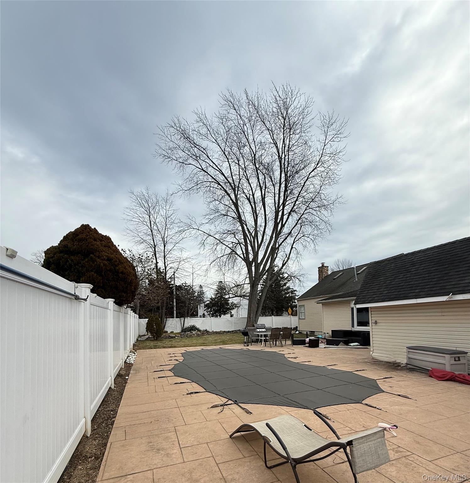 57 Laurel Road Lindenhurst, NY 11757 - Photo 23 of 24 a view of a city with pathway