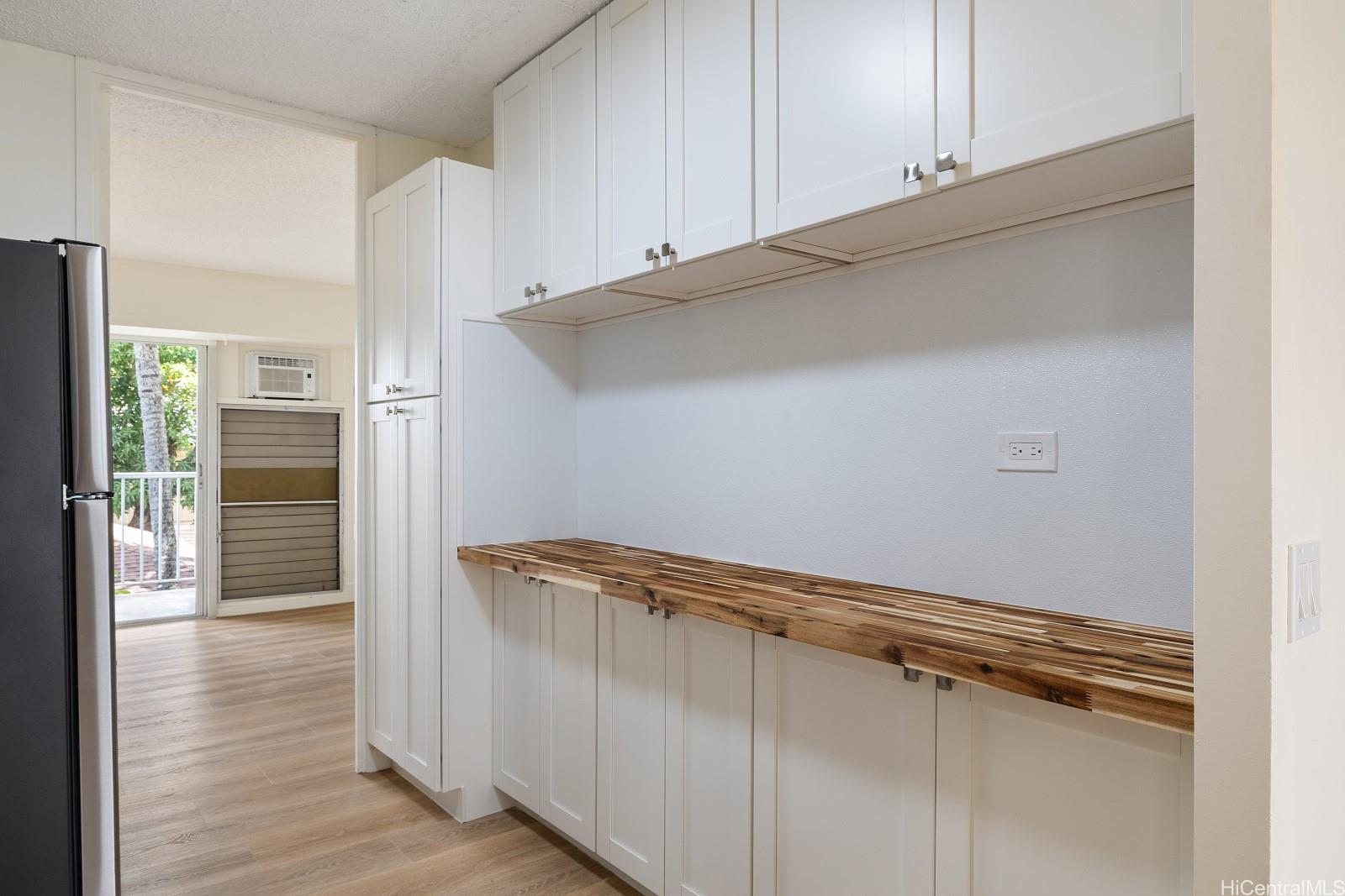 1516 Ward Avenue, Unit 302 Honolulu, HI 96822 - Photo 5 of 16 Brand new kitchen with well appointed stainless steel appliances and butcher block countertops