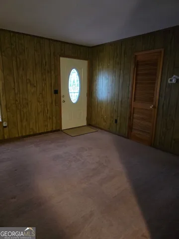 a view of a room with a window