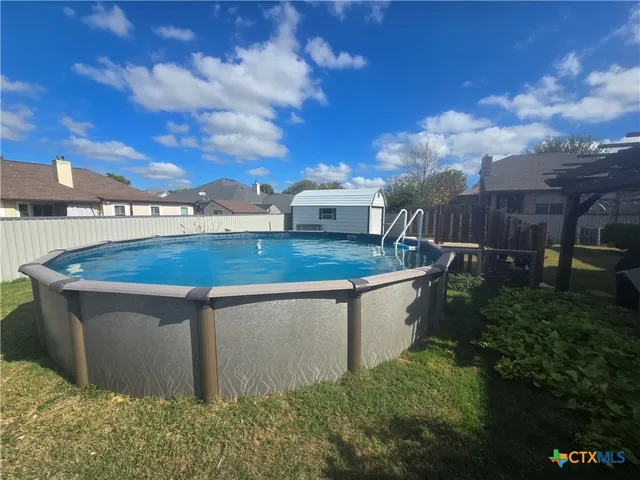 a view of a building with a yard