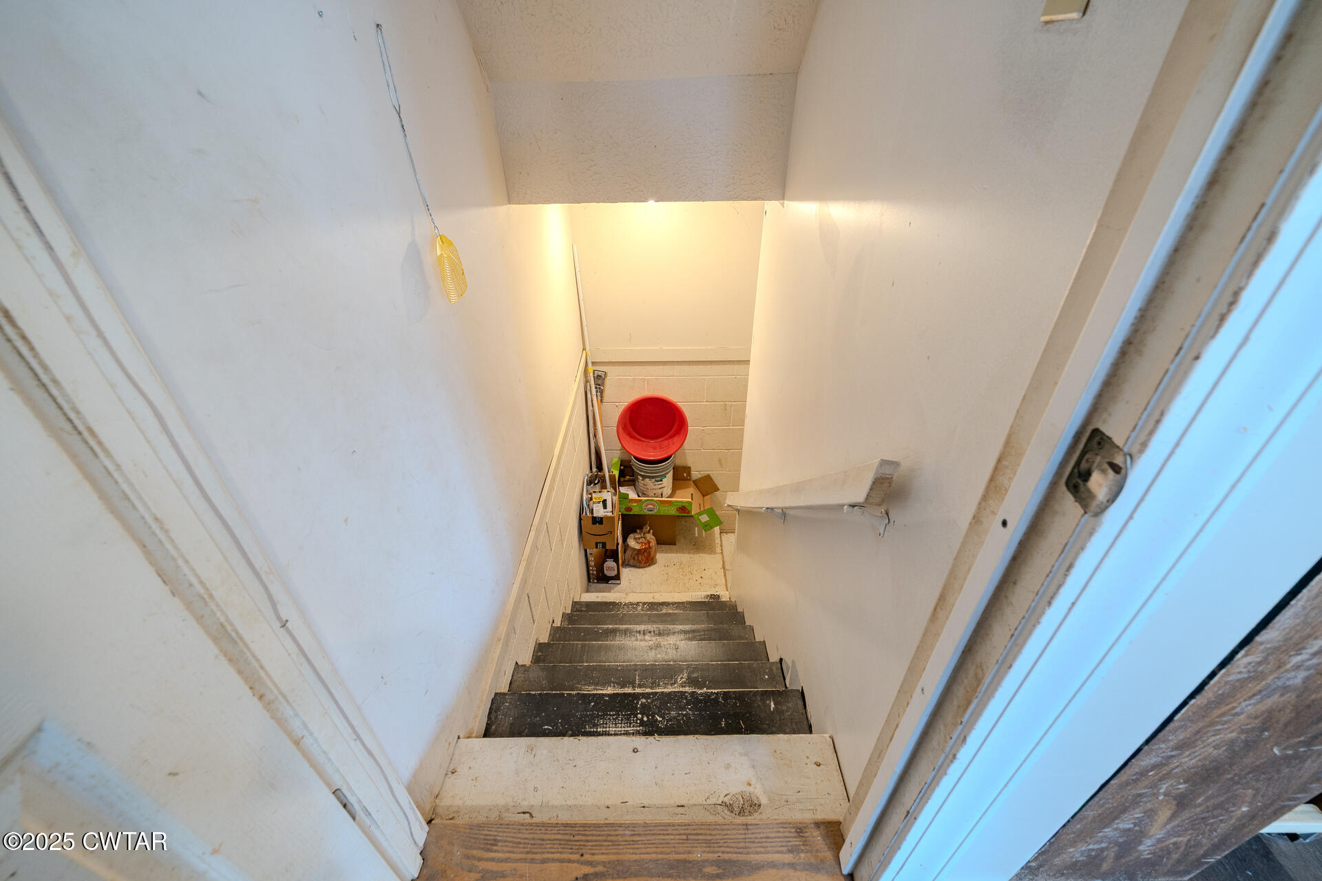 43 Paddock Place Jackson, TN 38305 - Photo 30 of 38 a view of a hallway with the door and stairs
