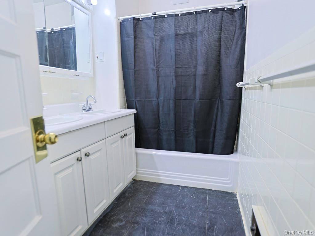 113 Hooker Avenue Poughkeepsie, NY 12601 - Photo 15 of 49 Full bath with shower / bathtub combination with curtain and vanity