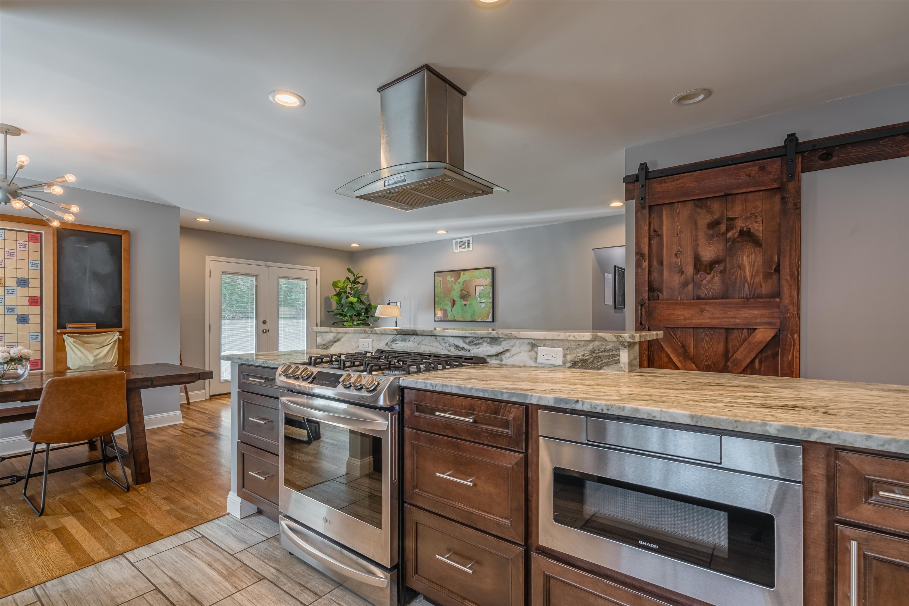 367 Green Acres Road Memphis, TN 38117 - Photo 2 of 27 a kitchen with a stove and cabinets