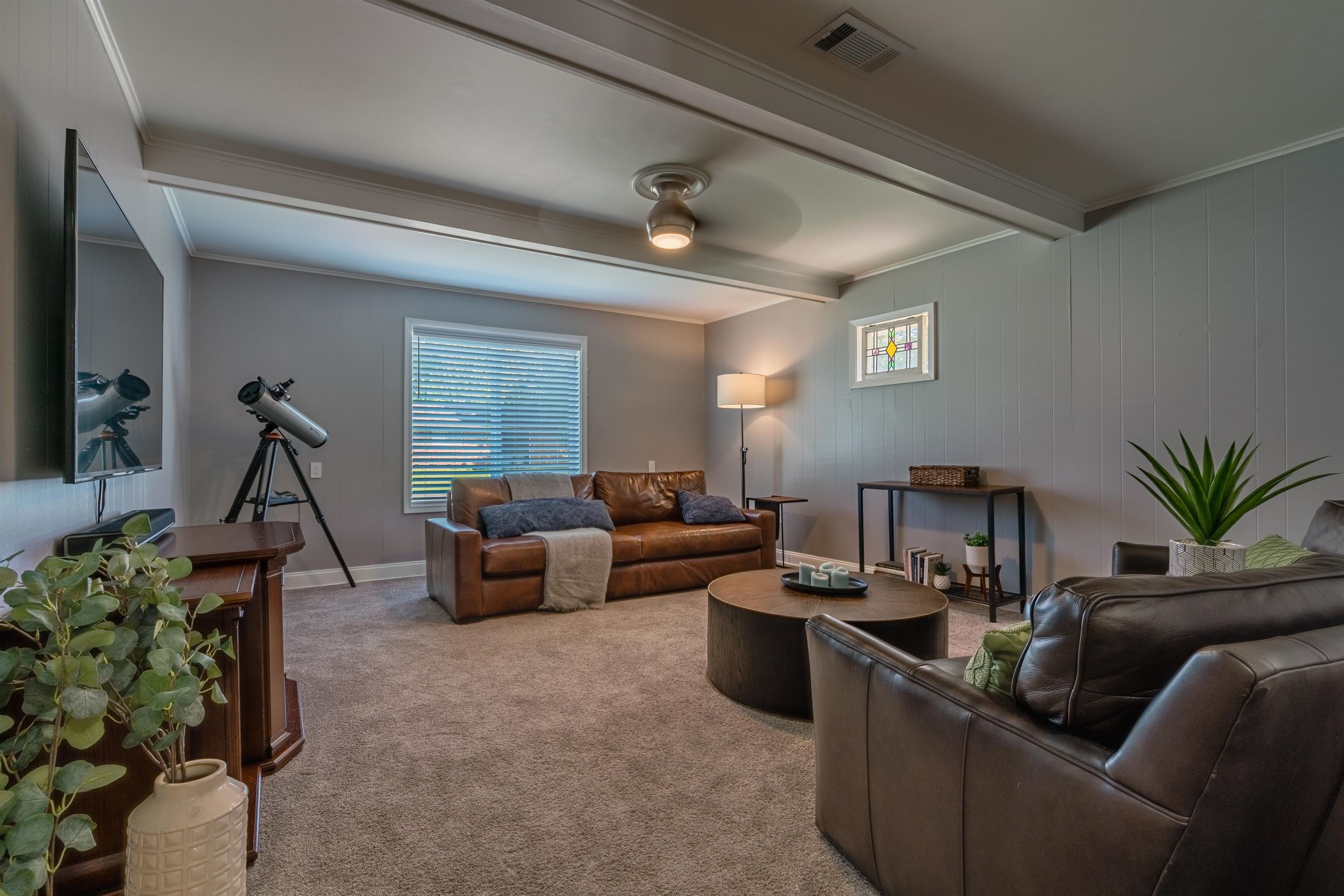 367 Green Acres Road Memphis, TN 38117 - Photo 8 of 27 a living room with furniture potted plant and a window
