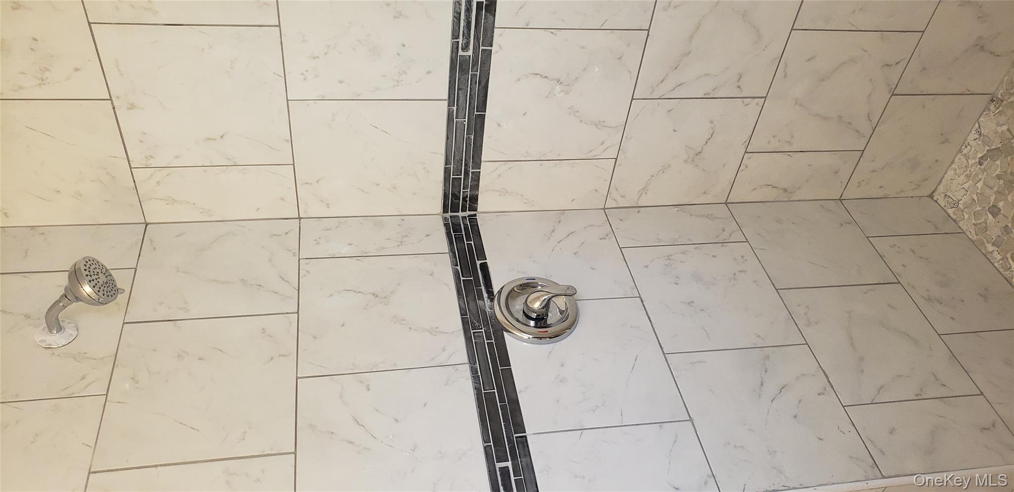 42 Hillside Avenue Monticello, NY 12701 - Photo 8 of 12 a bathroom with a shower and a shower