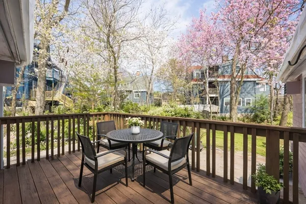 a view of a chairs on the roof deck