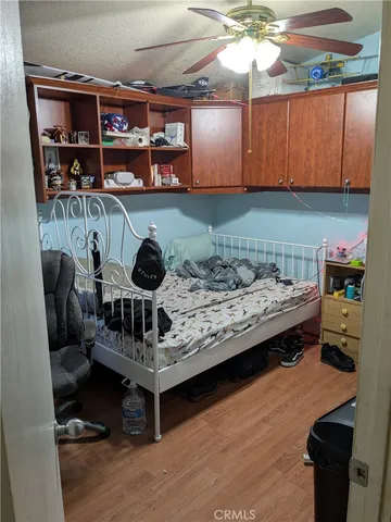 a room with furniture and wooden floor