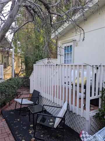 a view of a wooden bench in balcony
