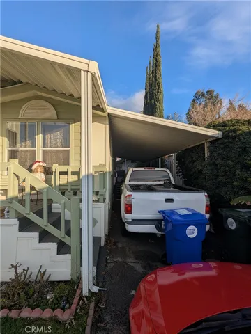 a front view of a house with outdoor space