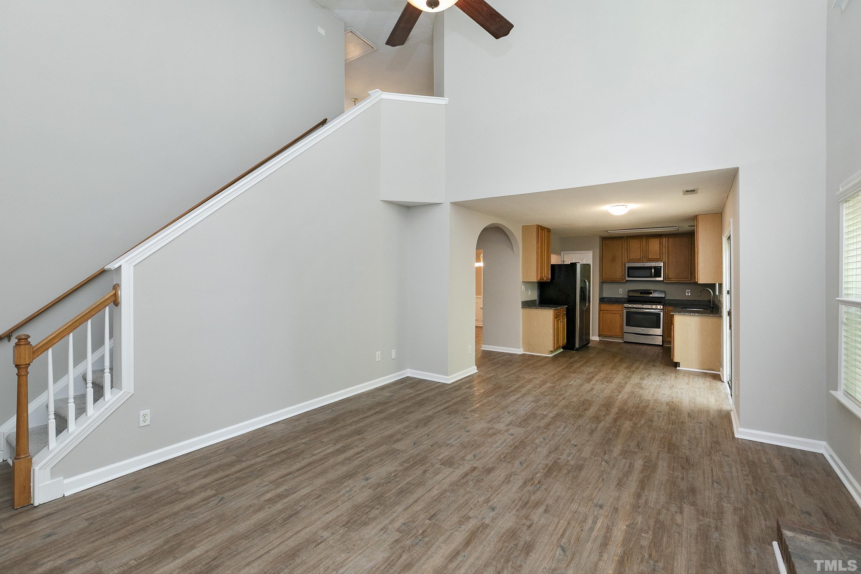 613 Branchview Drive Durham, NC 27713 - Photo 16 of 40 a view of empty room with wooden floor