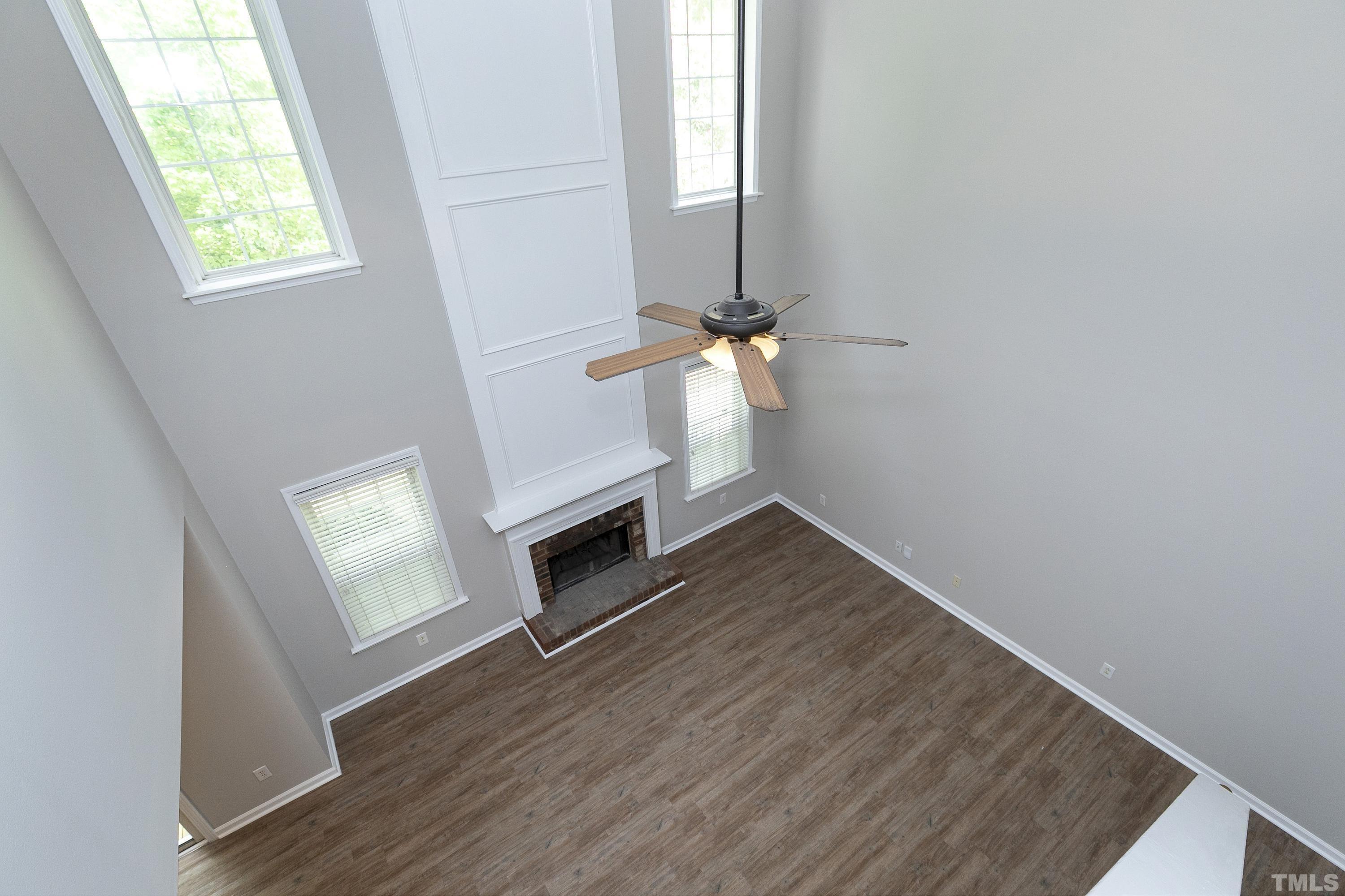 613 Branchview Drive Durham, NC 27713 - Photo 21 of 40 wooden floor in an empty room with a window