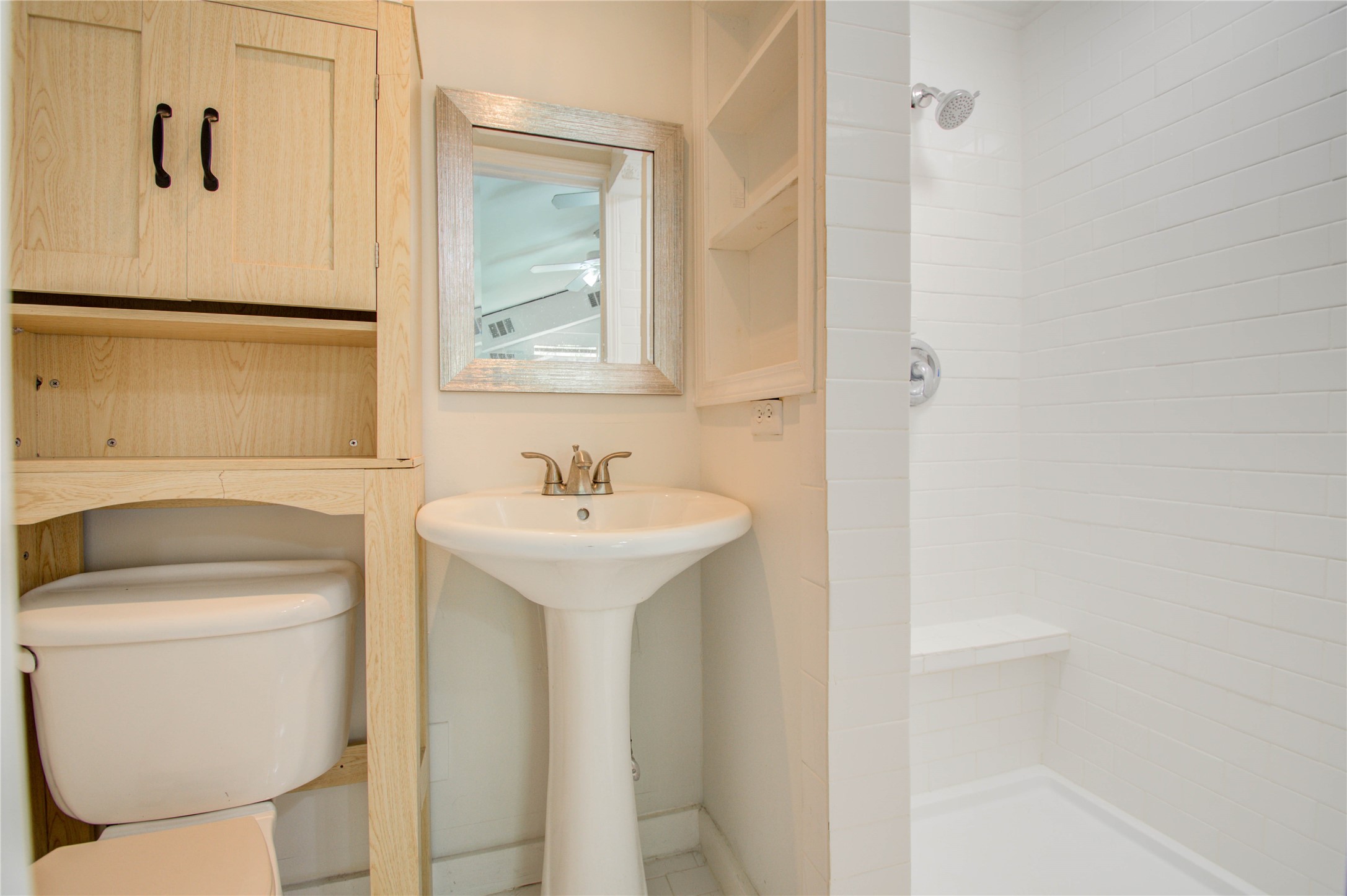 5311 Palmetto Street, Unit C Houston, TX 77081 - Photo 15 of 20 a bathroom with a sink toilet and shower