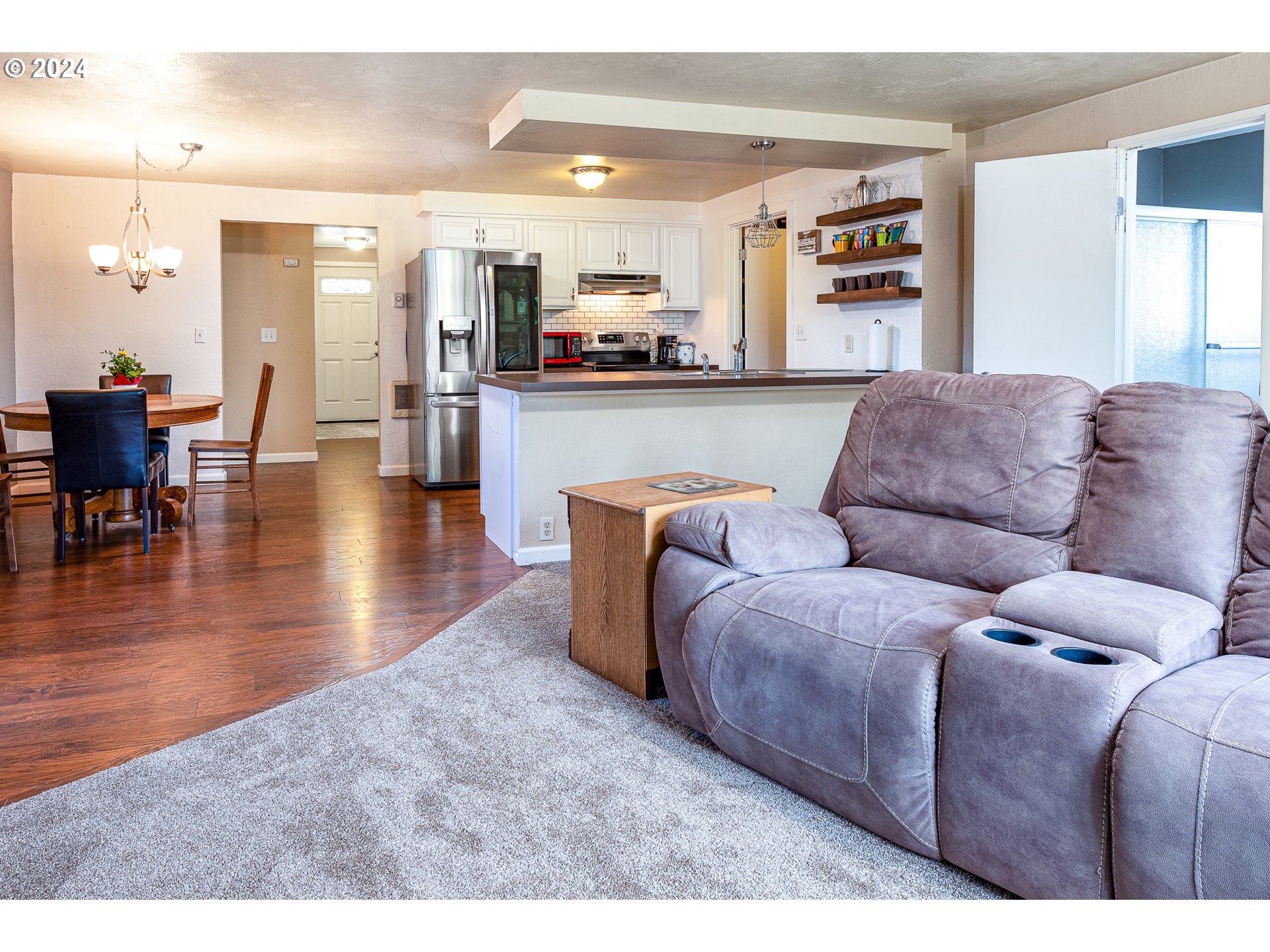 3870 Richland Street Springfield, OR 97478 - Photo 29 of 41 a living room with furniture and kitchen view