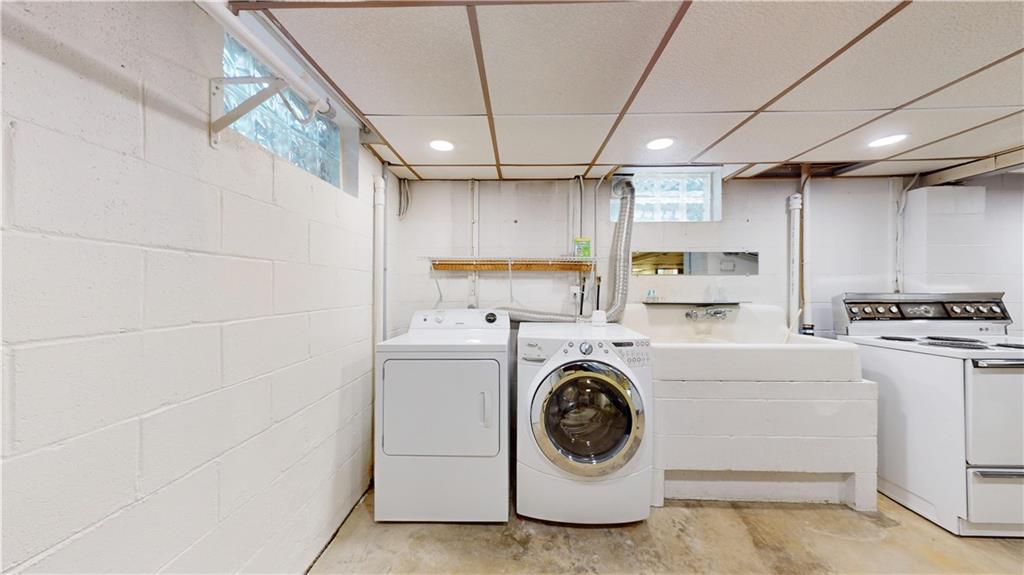 721 Herman Road Butler, PA 16002 - Photo 27 of 32 a utility room with dryer and washer