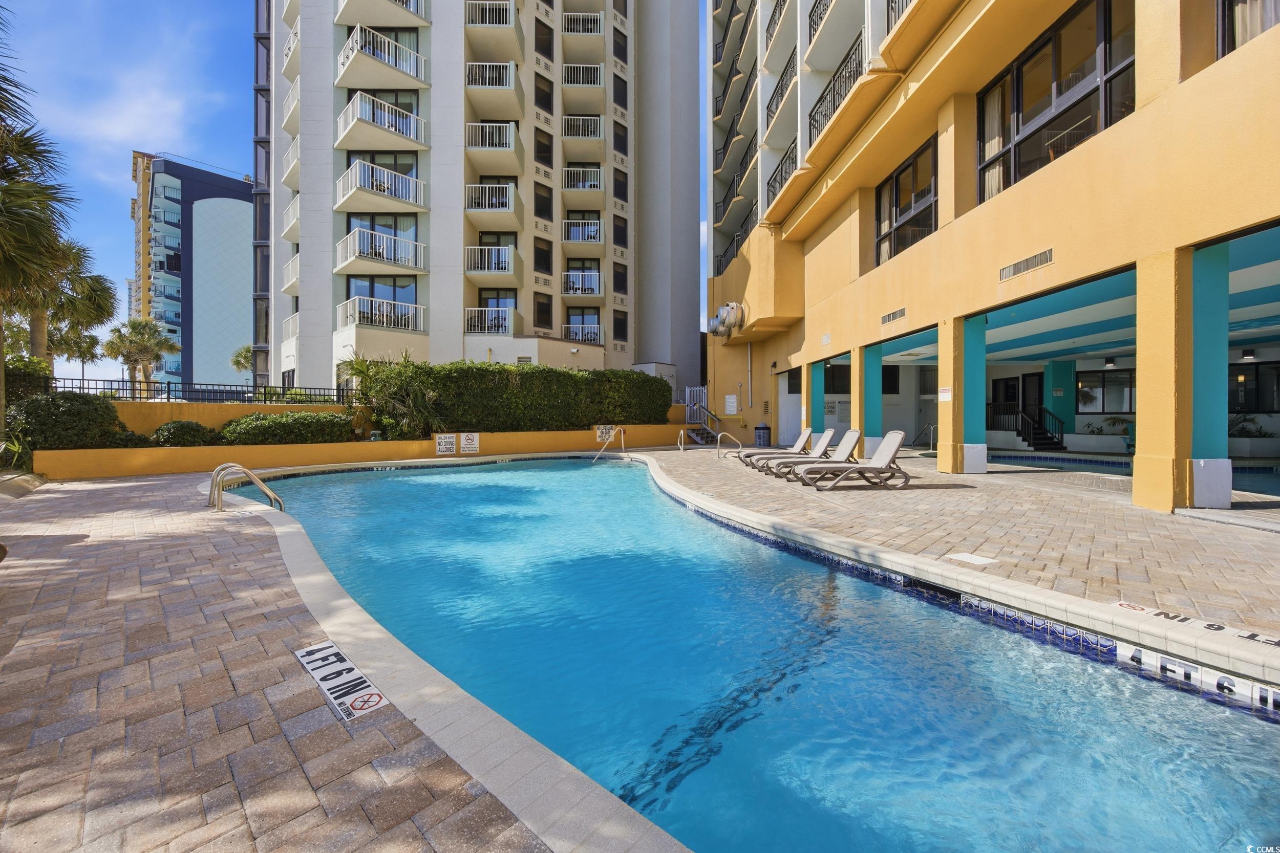 2710 North Ocean Boulevard, Unit 702 Myrtle Beach, SC 29577 - Photo 24 of 38 View of community pool