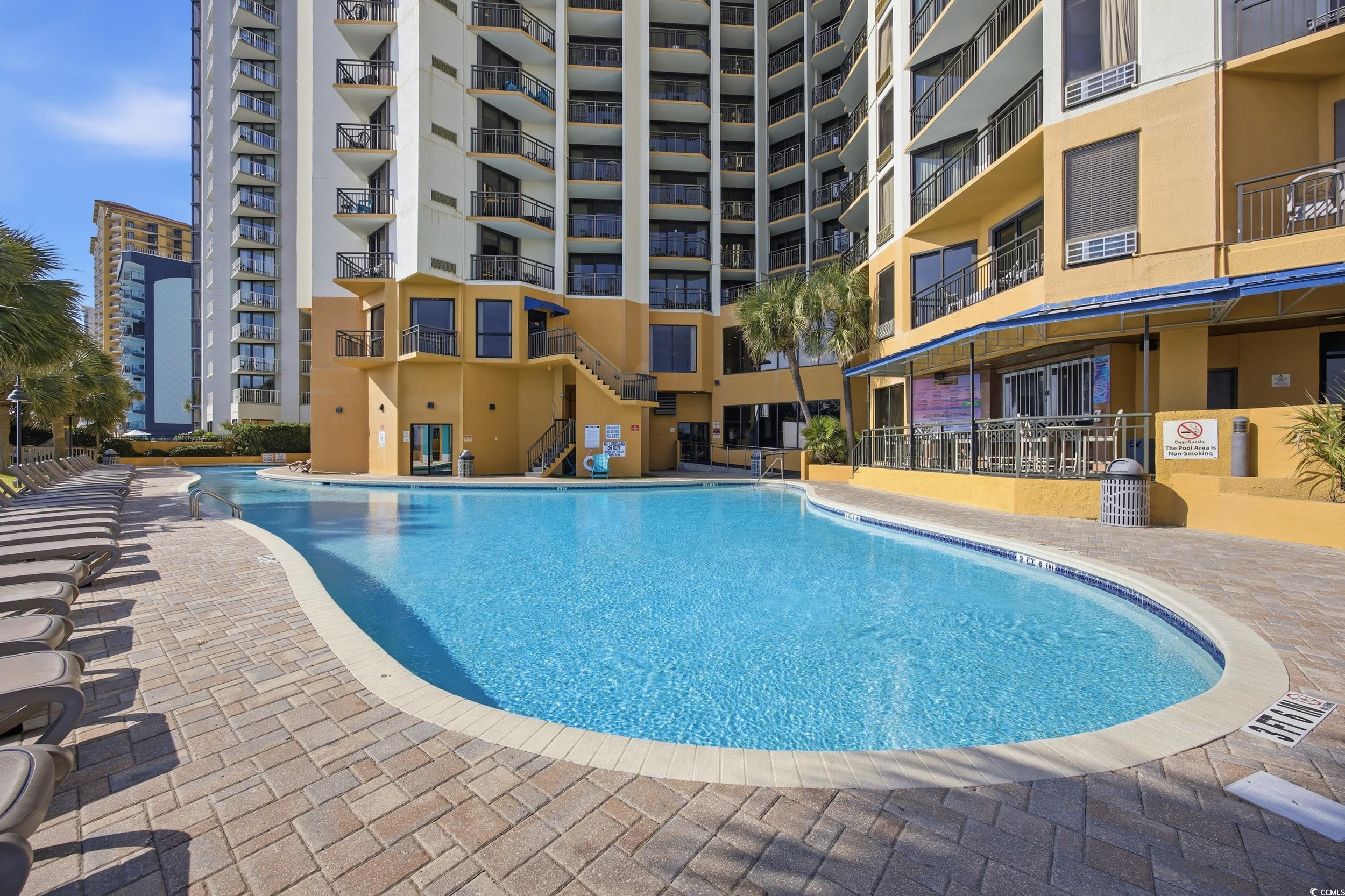 2710 North Ocean Boulevard, Unit 702 Myrtle Beach, SC 29577 - Photo 25 of 38 View of community pool