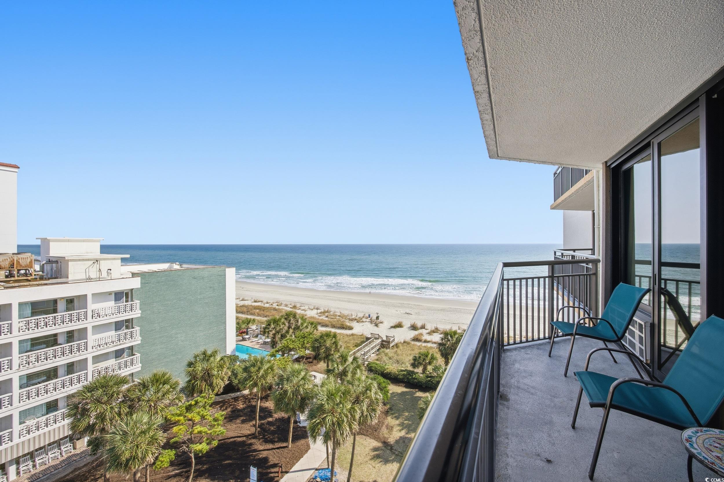 2710 North Ocean Boulevard, Unit 702 Myrtle Beach, SC 29577 - Photo 7 of 38 Balcony with view of water and beach