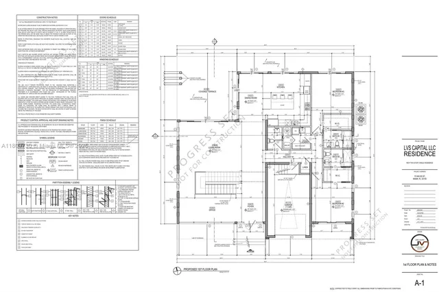 a black and white photo of a living room